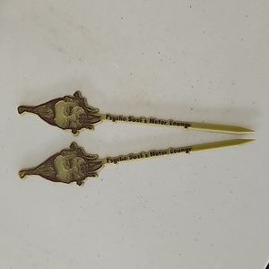 Psycho Suzi's Shrunken Head stir sticks